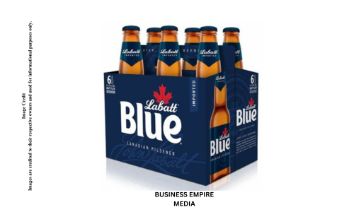 A bottle of Labatt Blue beer with its recognizable blue label and white logo, placed against a plain background. The bottle showcases the classic design of this popular Canadian lager.